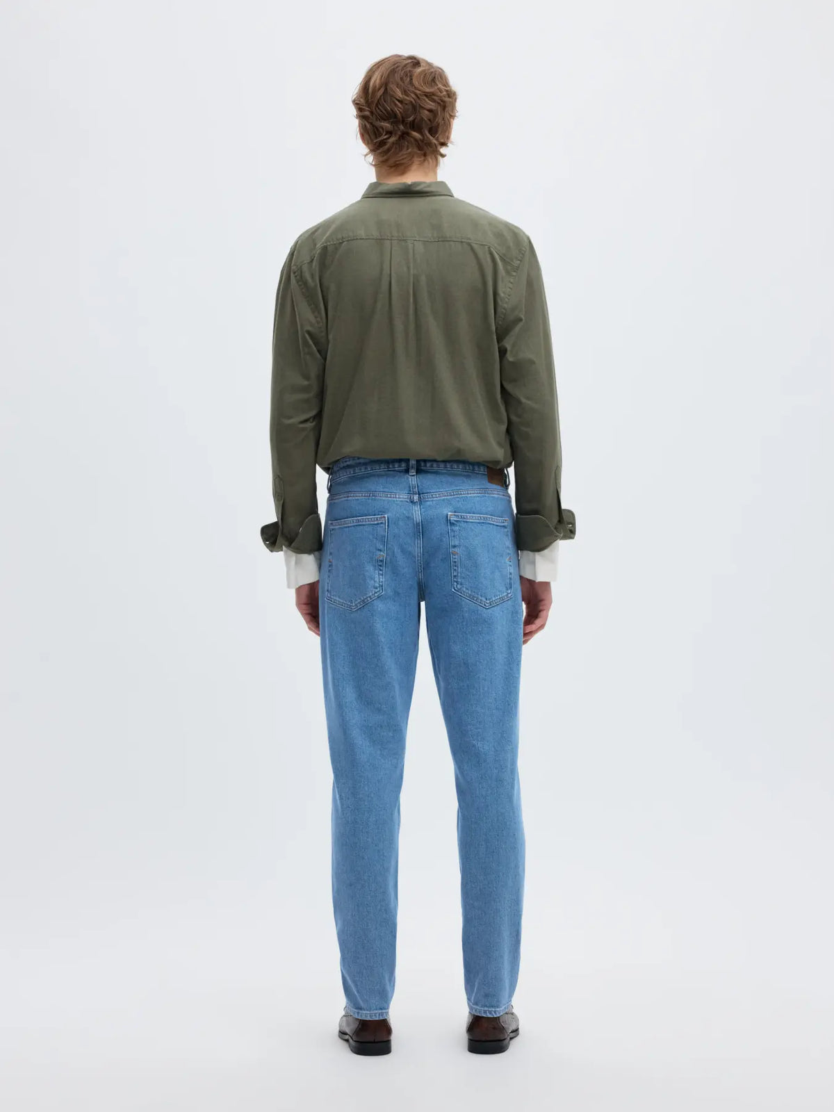Jeans de corte slim confeccionados en denim